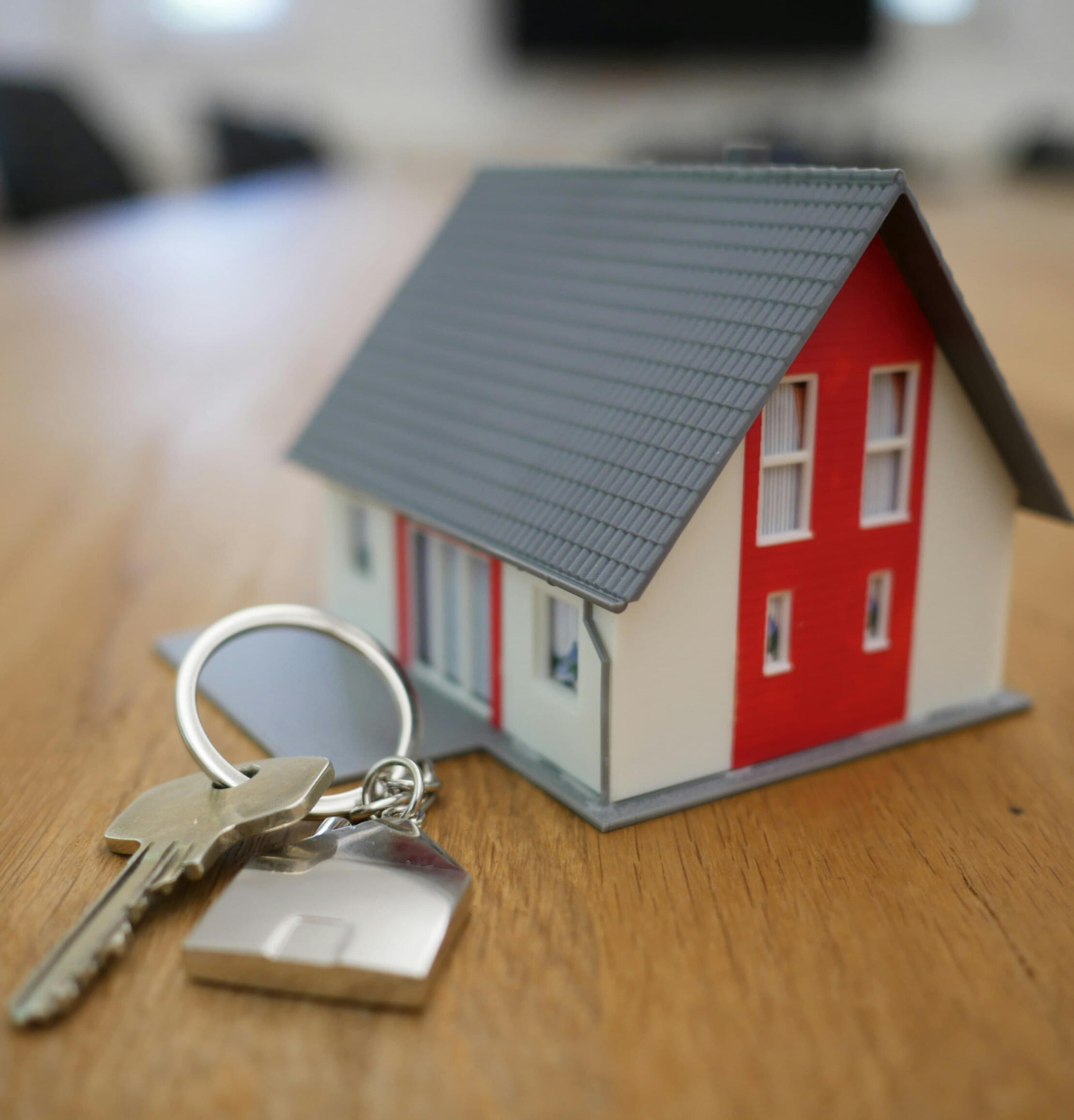 Vivienda y Propiedad Casa con llaves representando la compra de una vivienda en Australia